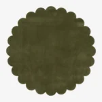 Top down view of the circular Forest Mirage green hand tufted wool rug on a white background showing the scalloped border.