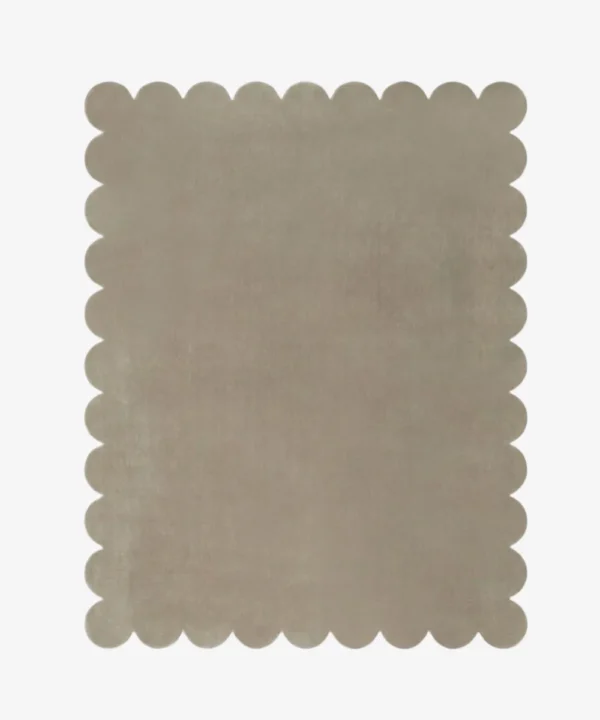 Top down view of the Moonstone grey hand tufted wool rug on a white background showing the rectangular shape and scalloped edges.