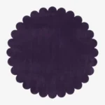 Top down view of the Plum Eclipse circular rug showing the deep violet wool color and scalloped edges.