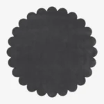 Top down flat lay view of the Slate Cloud round rug showing the dark charcoal grey wool color and scalloped border.