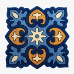 Top down view of the Azure Heirloom square rug featuring a traditional tile inspired geometric pattern with ornate blue and gold motifs and scalloped edges.