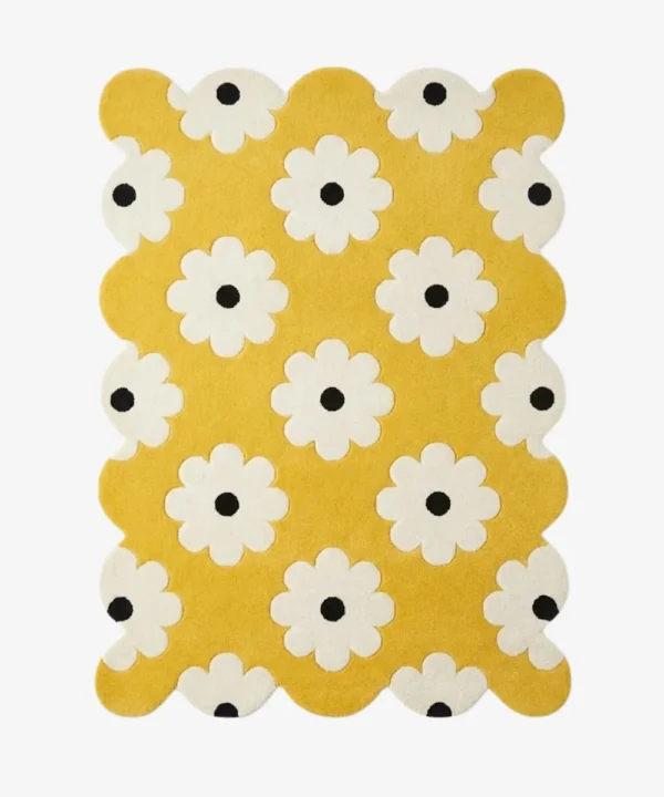 A retro inspired yellow area rug with a playful pop art flower design and decorative wavy scalloped borders.