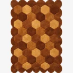 High angle view of the Cocoa Harlequin rug featuring a classic diamond checkerboard pattern in warm brown, tan, and cream wool tones, framed by a scalloped border.