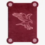Top down view of the Ember Crest rug featuring a deep maroon wool background with a stylized light pink line art illustration of an eagle in flight, framed by decorative circular corner accents.