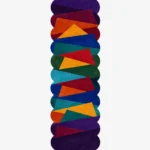 Top down view of the Jewel Shards runner rug on a white background, featuring a vibrant geometric pattern of overlapping angular shapes in deep jewel tones like purple, teal, and orange with scalloped edges.