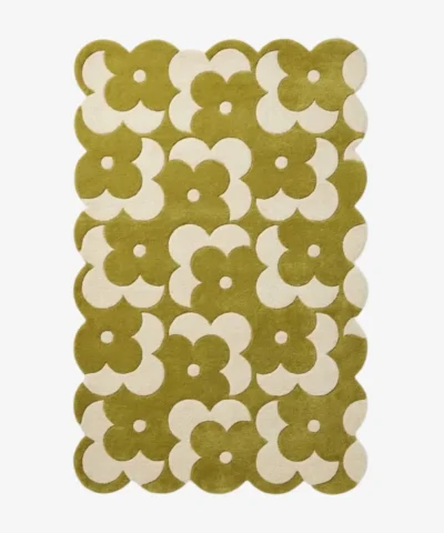 Top down view of the Moss Parade rug featuring an earthy moss green background with a retro grid pattern of white flowers.