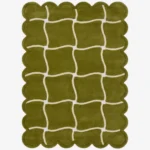 Top down view of the Moss Weave rug featuring a deep moss green wool background with a playful cream wavy grid pattern and custom scalloped edges.