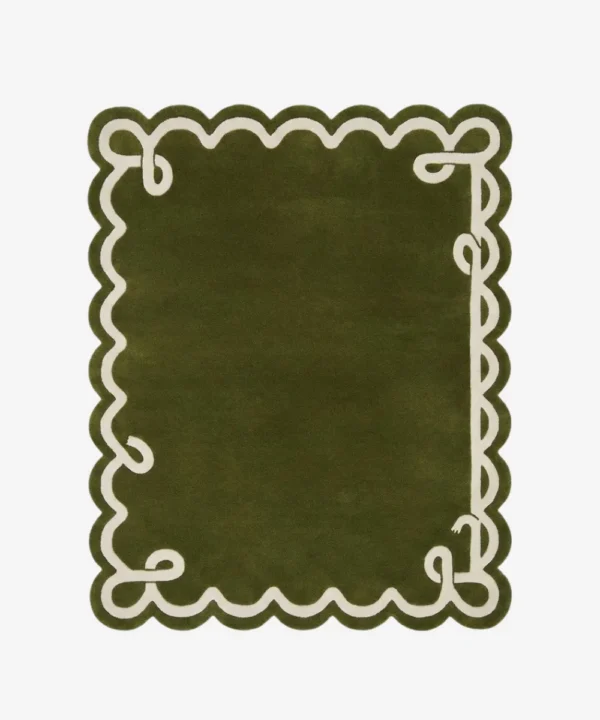 Top down view of the Olive Reverie rug featuring a deep olive green wool background with a decorative cream ribbon border design and elegant custom scalloped edges.