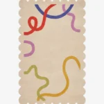 Top down flat lay of the Pastel Doodle rug featuring a soft cream background with playful abstract lines in red blue purple and yellow.