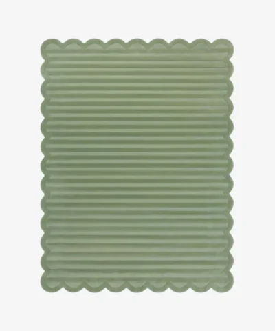 Top down view of the Sage Rhythm rug featuring a solid sage green color with horizontal carved textures and decorative scalloped edges.