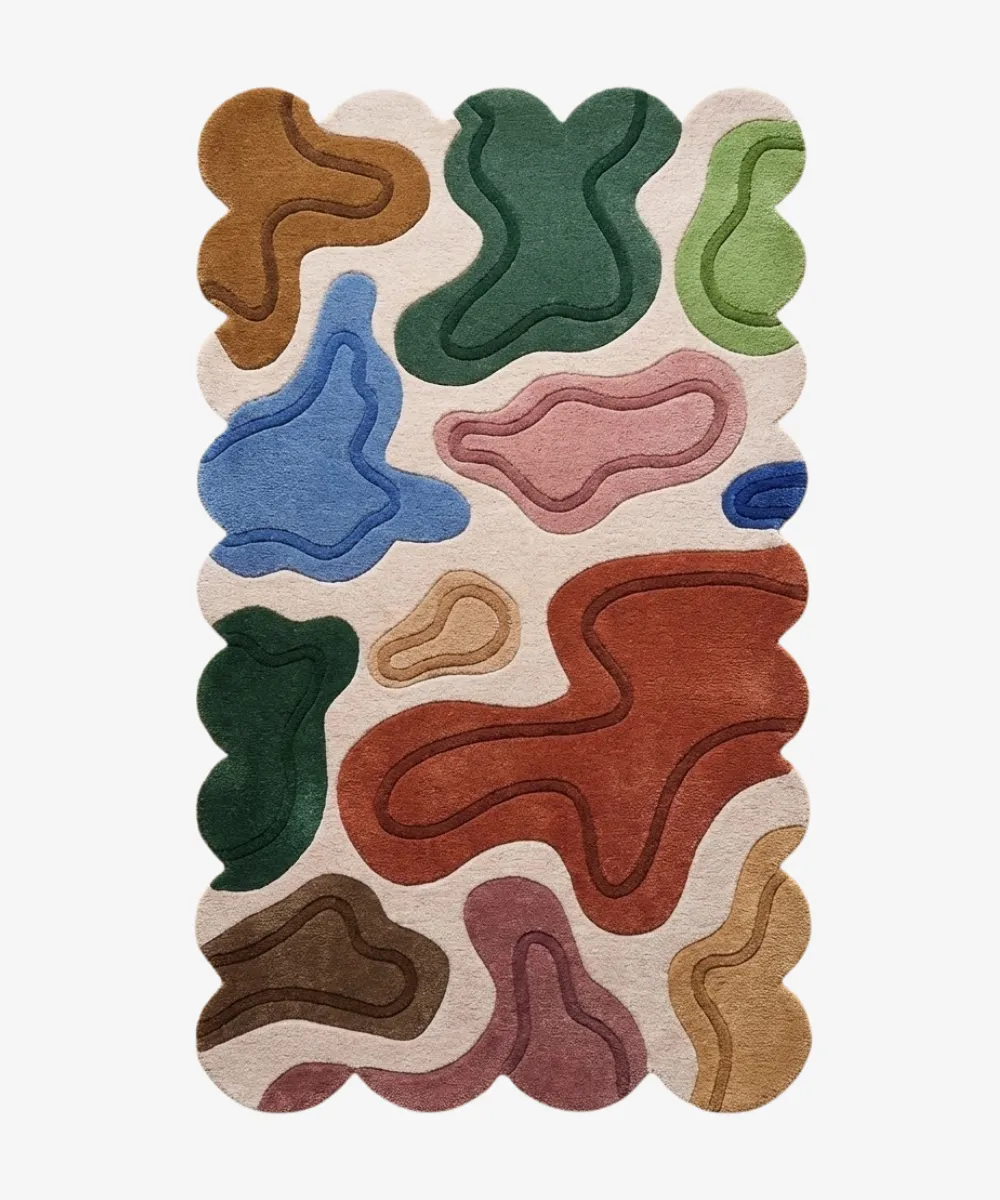 A colorful wool rug featuring organic abstract shapes and wavy borders, representing the Abstract Rugs category for contemporary interiors.
