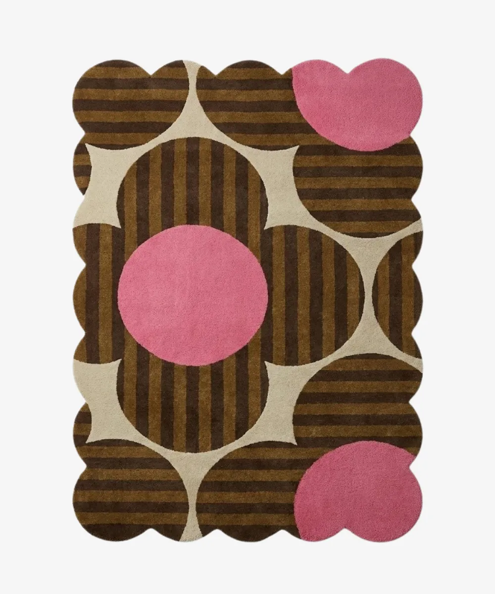 A retro style brown and pink flower design rug with scalloped edges, representing the Floral and Botanical Rugs category.