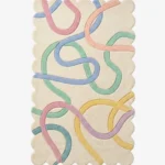 Top down view of the Sorbet Stream rug featuring a soft cream background with playful pastel colored abstract ribbons in pink blue green and yellow.