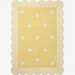 Top down view of the Buttercream Bloom rug featuring a soft yellow rectangular center with a white star pattern, completely surrounded by a decorative cream scalloped border.