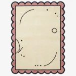 Top down view of the Canvas Scribble rug featuring a playful, abstract design of freehand black scribbles on a neutral cream wool background, finished with custom scalloped edges.