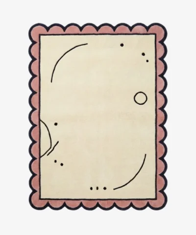 Top down view of the Canvas Scribble rug featuring a playful, abstract design of freehand black scribbles on a neutral cream wool background, finished with custom scalloped edges.