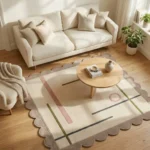 Perspective view of the Clay Trace rug styled in a sunlit living room, featuring a cream background with minimalist pink and green lines and a scalloped border.