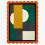 Top down view of the Dark Solis rug featuring a dramatic sun-burst design in deep charcoal and black wool with contrasting accents, finished with custom scalloped edges.