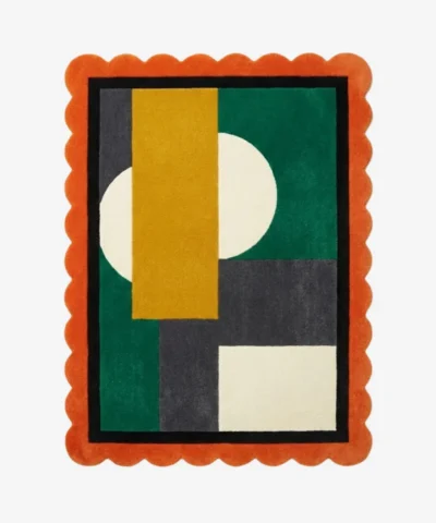 Top down view of the Dark Solis rug featuring a dramatic sun-burst design in deep charcoal and black wool with contrasting accents, finished with custom scalloped edges.