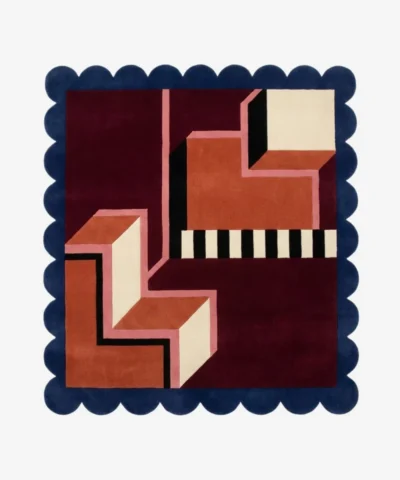 Top down view of the Noir Blocks Square Rug featuring a striking geometric pattern of alternating deep noir black and charcoal grey blocks, finished with a custom scalloped edge.