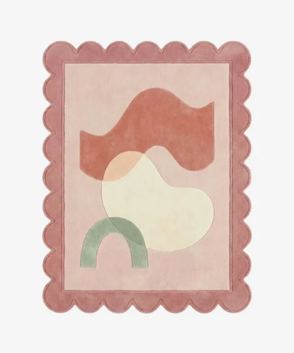 Top down view of the Peach Wisp rug featuring a delicate, airy design in soft peach and cream wool, mimicking the look of floating wisps, finished with custom scalloped edges.