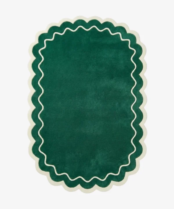 Top down view of the Pine Estate rug featuring a solid pine green wool background with a decorative cream wavy line and scalloped border.