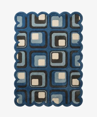 Top down view of the Retrose Orchid rug featuring a vibrant retro grid design of nested rounded squares in navy, light blue, grey, and cream, completely surrounded by a continuous blue scalloped border.