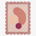 Top down view of the Rose Veil rug featuring a romantic, ethereal design with layers of soft rose pink and sheer white accents, finished with custom scalloped edges.