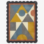 Top down view of the Saffron Drift rug featuring a warm saffron yellow and geometric pattern that creates a sense of movement, finished with custom scalloped edges.