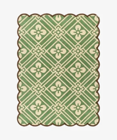 Top-down view of the Sage Dream rug against a white background, featuring an intricate repeating geometric lattice pattern with four-petal floral motifs in cream over a sage green background, framed by a continuous brown scalloped border.