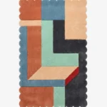 Top down view of the Soft Switch rug featuring a plush wool background with a crisp geometric grid pattern and custom scalloped edges, offering a modern and structured aesthetic.