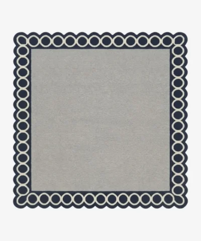 Top-down view of the Chain Frame square rug featuring a solid light grey center field framed by a bold navy blue border with interlocking white circular chain links.