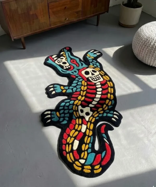 Close-up angled detail of the Alligator Skeleton rug's tail, emphasizing the thick hand-tufted New Zealand wool and the distinct carved separation between the curving white tail bones and black base.