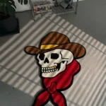 Close-up angled detail of the edge of the Cowboy Skull rug, showcasing the plush thickness of the hand-tufted pile and the clean, carved lines defining the brim of the cowboy hat.