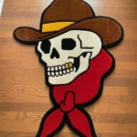 Top-down flat view of the Cowboy Skull rug, showcasing its bold American traditional tattoo flash design featuring a stylized skull wearing a classic western cowboy hat.