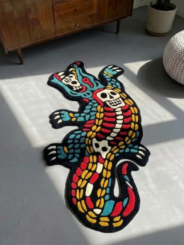 Close-up angled detail of the Alligator Skeleton rug's tail, emphasizing the thick hand-tufted New Zealand wool and the distinct carved separation between the curving white tail bones and black base.