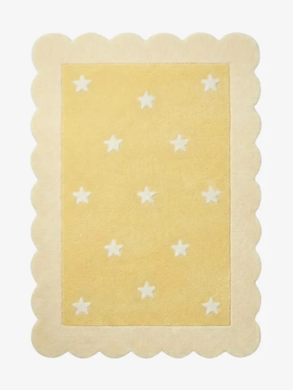 Top down view of the Buttercream Bloom rug featuring a soft yellow rectangular center with a white star pattern, completely surrounded by a decorative cream scalloped border.