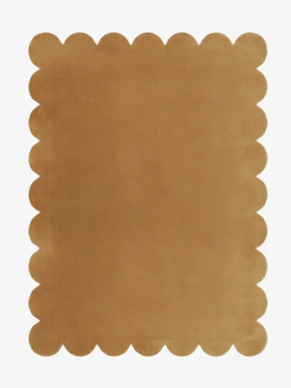 Thumbnail view of the rectangular Desert Dune Hand Tufted Wool Rug featuring a wavy scalloped border in a warm sandy brown tone.