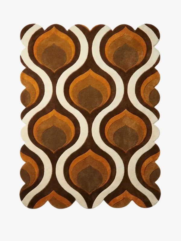 Top down flat lay of the Honeyed Waves rug featuring a retro 70s inspired ogee pattern with wavy layers of brown, amber, orange, and cream wool.