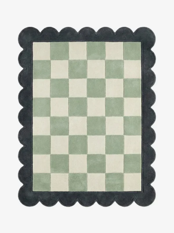 Top down view of the Lune Mist rug featuring a serene grey and off-white wool background with abstract crescent-inspired curves, finished with custom scalloped edges.