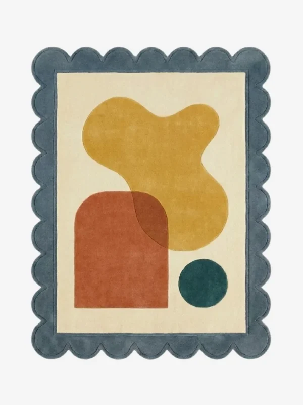 Top down view of the Ochre Loom rug featuring a warm mustard yellow wool background with a textured, woven-inspired pattern, finished with custom scalloped edges.