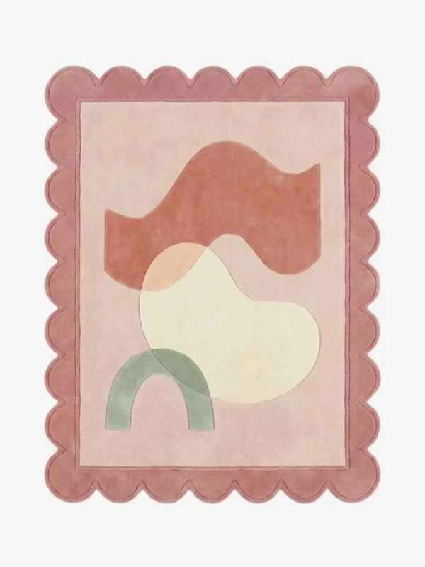 Top down view of the Peach Wisp rug featuring a delicate, airy design in soft peach and cream wool, mimicking the look of floating wisps, finished with custom scalloped edges.