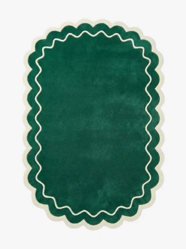 Top down view of the Pine Estate rug featuring a solid pine green wool background with a decorative cream wavy line and scalloped border.