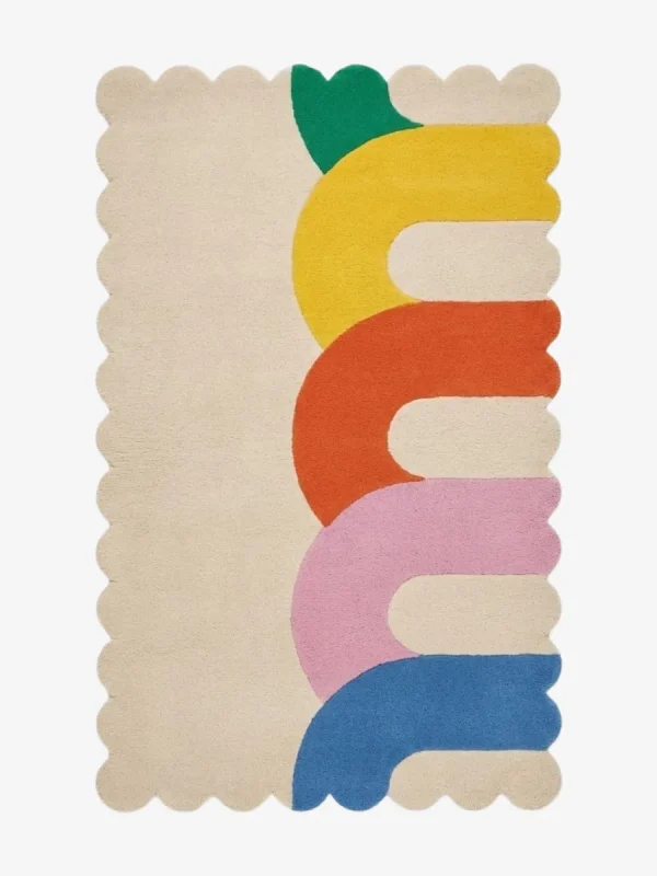 Top down view of the Rainbow Arcana rug featuring a soft cream background with colorful geometric rainbow arches in green yellow orange pink and blue.
