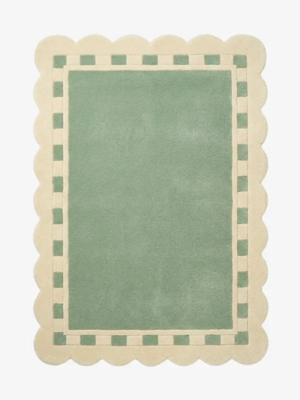 Top down view of the Sage Frame rug featuring a solid sage green center surrounded by a cream border with a decorative green square pattern and scalloped edges.