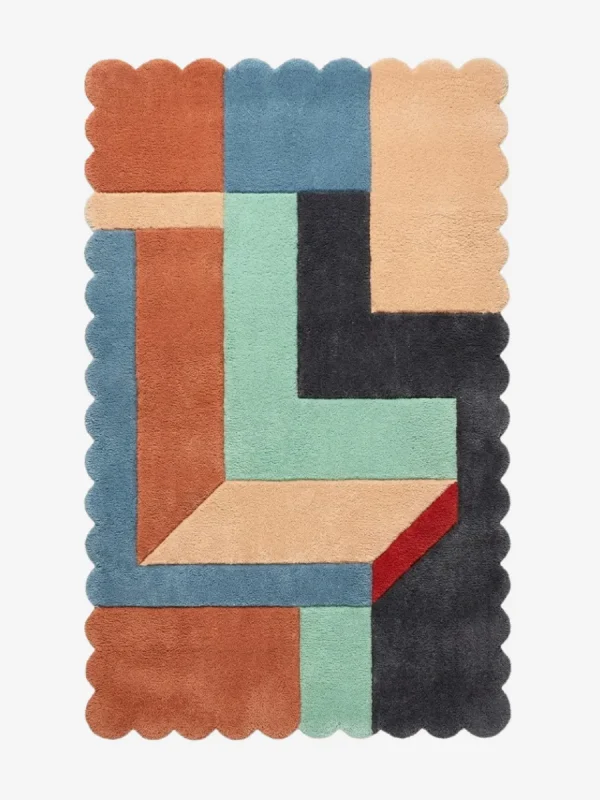 Top down view of the Soft Switch rug featuring a plush wool background with a crisp geometric grid pattern and custom scalloped edges, offering a modern and structured aesthetic.