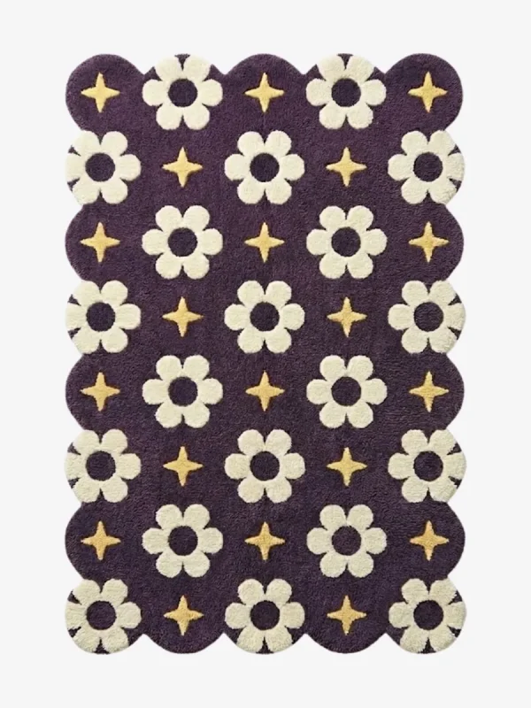 A celestial inspired purple wool rug with scalloped edges, decorated with repeating floral blooms and golden starlight motifs.