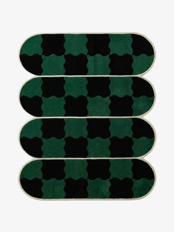 Top-down view of the Verdure Drift rug, featuring four horizontally stacked, pill-shaped segments defined by crisp cream borders, filled with a distorted, wavy checkerboard pattern in emerald green and black.